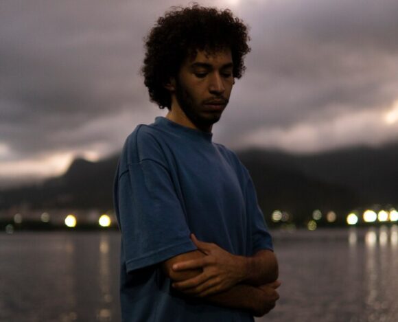 sad-contemplative-man-sitting-by-lake_23-2150516261 The Silent Crisis: Understanding Suicide in South Africa